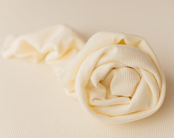 Pastelgele zitzak voor newbornfotografie - Studio-achtergrond