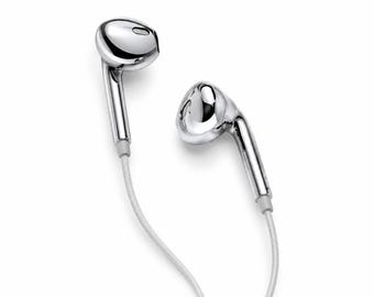 May include: A pair of wired earbuds with a polished chrome finish and a reflective metallic surface. The earbuds feature a rounded head design with a slender stem and are connected by thin, white braided cables that extend downward from each piece.