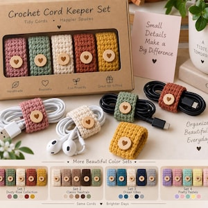 May include: A set of five crochet cord keepers in dusty rose, sage green, cream, terracotta, and mustard yellow, each featuring a wooden button with a heart cutout. The packaging is labeled Crochet Cord Keeper Set Tidy Cords Happier Spaces.
