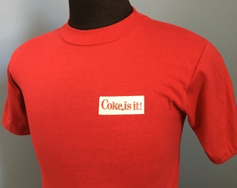 80s Vintage Coke Is It! Coca Cola Classic 1983 Crimestoppers Team Triathlon running race soda promo T-Shirt - SMALL
