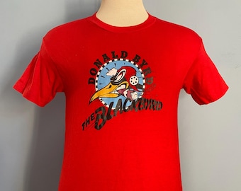 Camiseta vintage de Donald Byrd The Blackbyrd con trompeta de cuervo (años 70 y 80) - Talla pequeña