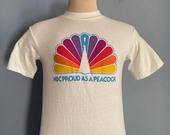 Camiseta promocional vintage de la NBC "Orgulloso como un pavo real" de los años 70 y 80 (talla pequeña)