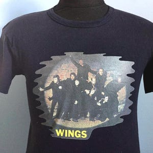 Camiseta promocional del concierto de rock de los Beatles de Paul McCartney de 1973, Wings Band on the Run (talla pequeña)