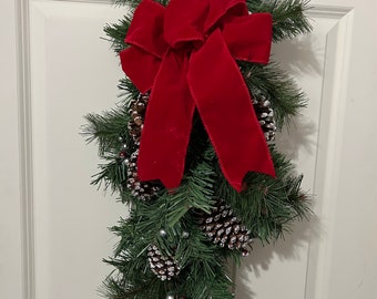 Pine Wall Swag with Pine cones and red bow , Christmas Door Swag, Pine Swag, Christmas Wall Decor, Winter Greenery, faux pine