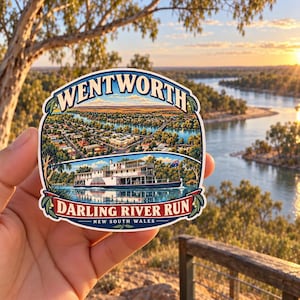 May include: A die-cut sticker featuring a scenic illustration of Wentworth, New South Wales, with a paddle steamer boat on the Darling River. The text reads WENTWORTH at the top and DARLING RIVER RUN NEW SOUTH WALES at the bottom in bold letters.