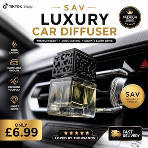 May include: A square glass car diffuser bottle with a black decorative cap attached to a vehicle air vent. The bottle contains a golden liquid. Text on the image includes SAV LUXURY CAR DIFFUSER, PREMIUM SCENT, LONG LASTING, ELEVATE EVERY DRIVE, and SAV INSPIRED BY SAUVAGE.