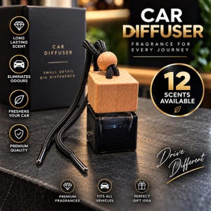 May include: A car diffuser featuring a square glass bottle with dark liquid, topped with a light wood cap and a round wooden bead. A black braided cord with metal tips is attached. The packaging box displays the text CAR DIFFUSER SMALL DETAIL BIG DIFFERENCE, while other text includes 12 SCENTS AVAILABLE and Drive Different.