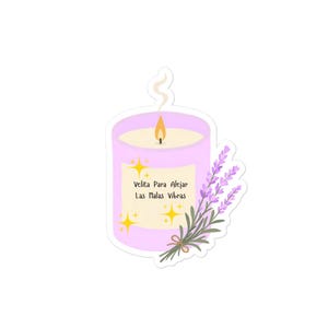 May include: A sticker illustration of a light purple candle with a lit flame and a wisp of smoke. The label features yellow star accents and the text Velita Para Alejar Las Malas Vibras. A sprig of purple lavender is tied to the side of the candle.