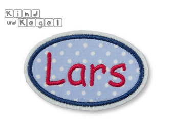 Patch iron-on oval shield + name red, 7.5 x 4.5 cm, fabric light blue-white dotted, contour dark blue, frame, nameplate, label