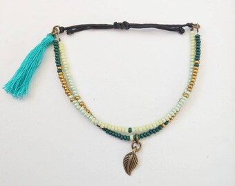 Boho summer seed bead bracelet with tassel and leaf charm, green gold, Hippie bracelet, boho bracelet, adjustable