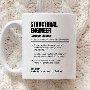 May include: A white ceramic mug featuring black printed text that defines a structural engineer as a strength designer. The text includes a phonetic pronunciation, a noun classification, and three bullet points describing professional duties.