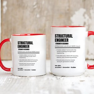 May include: Two white ceramic mugs with bright red interiors and handles. Each mug features black printed text defining a structural engineer as a strength designer, including bullet points about resilient frameworks, accuracy, and precision.