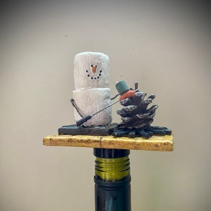 Unique S’more Bottle Stopper. Use for a wine or liquor bottle. Great bar gift for the campfire S’more loving friend!