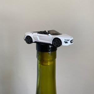 White Audi Bottle Stopper decorate any wine or liquor bottle with this great car stopper!!
