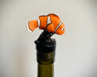 Orange Disney Coral Bottle Stopper! Fun cartoon fish decoration for your wine or liquor.