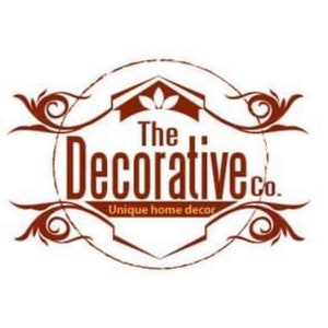 May include: A brown logo with a house icon and the text 'The Decorative Co.' in a circle with the words 'Unique home decor' below. The logo is surrounded by two decorative swirls.