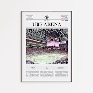 May include: A framed poster featuring a photograph of the interior of UBS Arena in Elmont, NY. The print includes the text 'OPENED 2021', 'STADIUM REPORT', and 'UBS ARENA', along with capacity and coordinate data, and a small hockey player graphic.