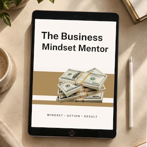 May include: A tablet screen displaying the title The Business Mindset Mentor in black text. Below the title is a graphic of stacked one hundred dollar bills. At the bottom, the text reads MINDSET • ACTION • RESULT on a white background.