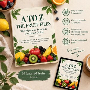 May include: A book titled A TO Z THE FRUIT FILES The Ripeness, Season & Nutrition Guide with a cover featuring various fruits like apples, bananas, and berries. A tablet displays the same cover, and text highlights 26 featured fruits.
