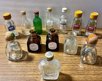 13 mini liquor glass bottles Need more cleaning