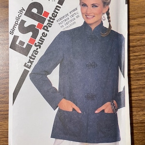 May include: A Simplicity E.S.P. Extra-Sure Pattern 5341 sewing envelope featuring a dark blue jacket with a mandarin collar, long sleeves, two front pockets, and three decorative frog closures. The text includes Simplicity, E.S.P., Extra-Sure Pattern, 5341, and size U.