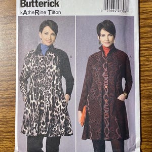 May include: A Butterick B6254 sewing pattern envelope by Katherine Tilton featuring two variations of a long-sleeved, button-front jacket. One version displays a black and white leopard print, while the other shows a dark brown patterned design.