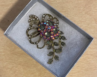 Floral rhinestone pin over 2" long