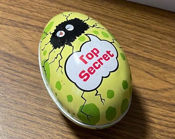 Russ Berrie Top Secret egg with T-rex dinosaur inside