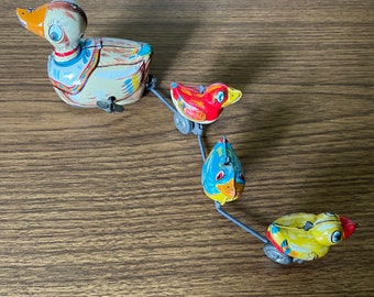 Tin ducks wind-up toy