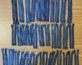 Lot of 35 metal zippers from deconstructed blue jeans