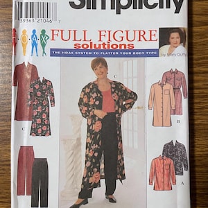 May include: A Simplicity sewing pattern envelope 7909 for full figure solutions by Mary Duffy. The white paper envelope features illustrations of various clothing styles including a long floral duster, solid trousers, and button-down shirts in sizes 18W-24W.