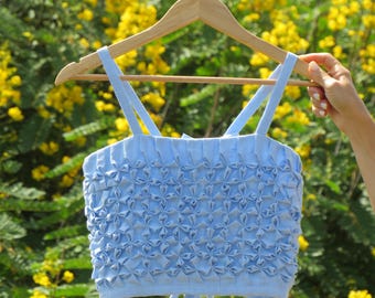 Bloemige, rokende, blauwe hemel top