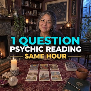 May include: A psychic reading service advertisement featuring the text 1 QUESTION PSYCHIC READING SAME HOUR. The image displays six tarot cards arranged on a red patterned tablecloth, a lit white candle, a crystal sphere, and a dark green journal.