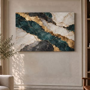 May include: A rectangular wall art piece featuring an abstract marble pattern with diagonal bands of white, dark teal, charcoal grey, and metallic gold veining. The composition displays a layered, stone-like texture across the surface.