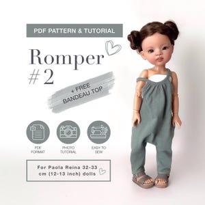 May include: A PDF pattern and tutorial for a doll romper and bandeau top. The text reads PDF PATTERN & TUTORIAL, Romper #2, + FREE BANDEAU TOP, PDF FORMAT, PHOTO TUTORIAL, EASY TO SEW, For Paola Reina 32-33 cm (12-13 inch) dolls. A doll wears the outfit.