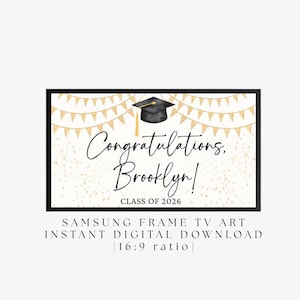 May include: A framed digital art print with a graduation theme. The artwork features the words "Congratulations, Brooklyn!" with a graduation cap and banner decorations. The text "CLASS OF 2026" is also included.