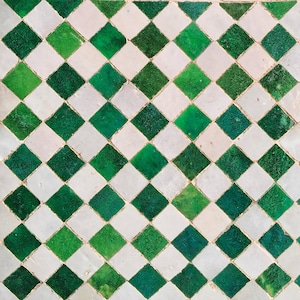 May include: A repeating geometric pattern of square tiles arranged in a diamond orientation. The surface features alternating solid emerald green tiles and off-white tiles, each with a slightly textured, glossy finish and visible grout lines.