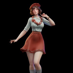 Può includere: Una statuetta di una persona che indossa un basco rosso, una camicia a colletto azzurro con pois scuri e una gonna a pieghe color ruggine. La figura presenta una collana fatta di piccole rose rosa e rosse, un braccialetto dorato e calzini grigi.