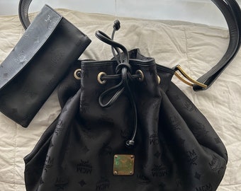 Black Canvas and Leather MCM Drawstring Bag with matching wallet