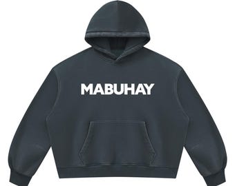 May include: A dark charcoal gray hooded sweatshirt featuring the word MABUHAY printed in bold white capital letters across the chest. This long-sleeve pullover garment includes a front kangaroo pocket, a drawstring-free hood, and ribbed cuffs.
