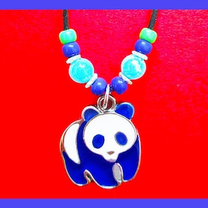 MOOD Necklace. Panda Pendant on a Black Cotton Cord. Matching beads.  Adjustable length, choker to long.  Changes colors. Symbol of Peace.