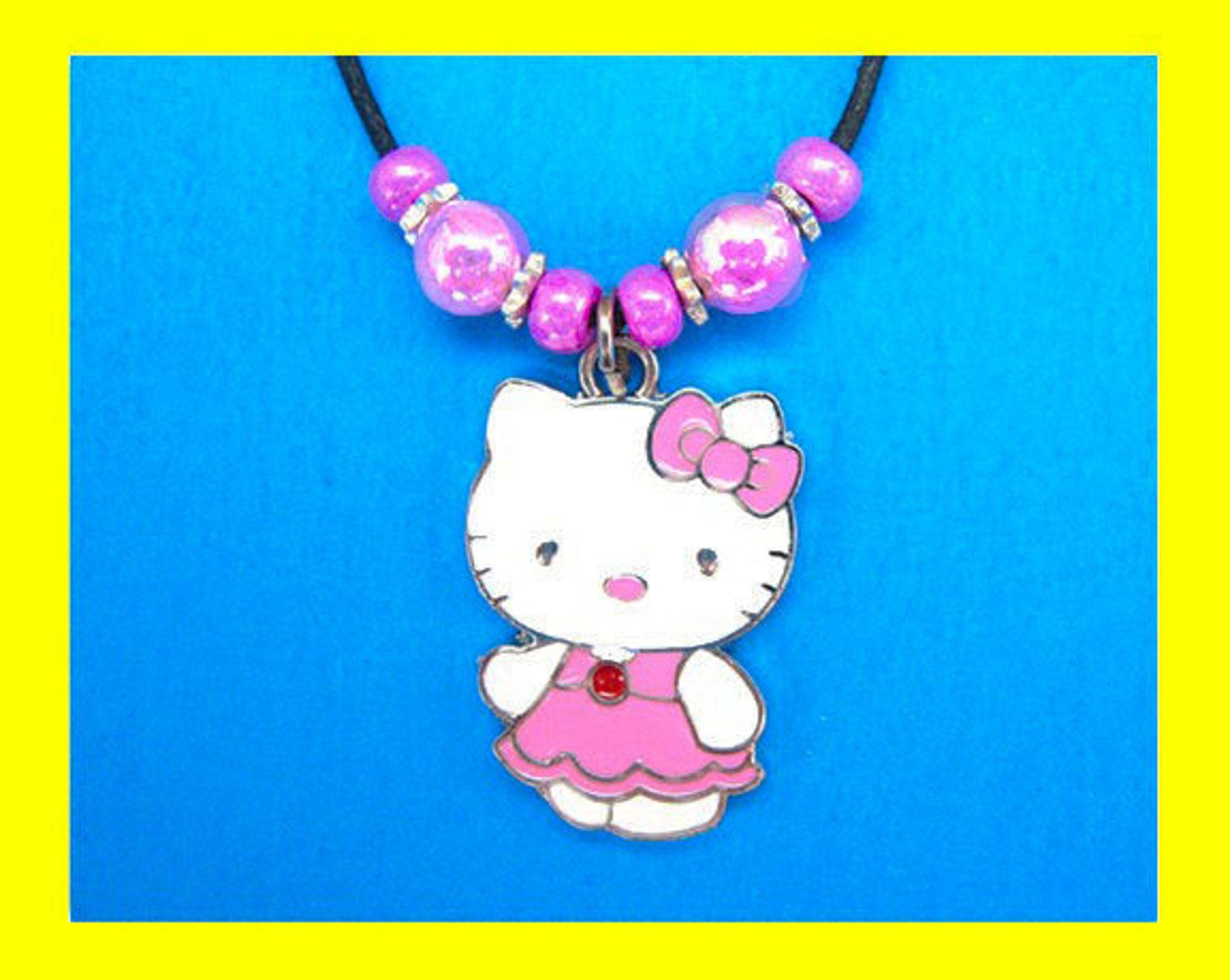 Necklace. Hello Kitty Pendant with matching beads on Black Etsy