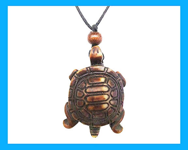 Protection. Turtle Pendant made of resin on black cotton cord Adjustable length; choker to long Necklace Symbol: Strength Unisex