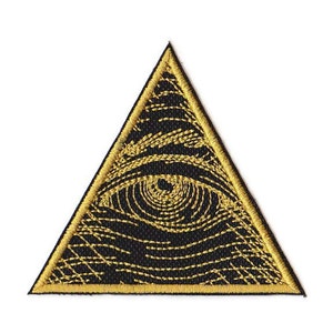 May include: A gold embroidered patch with a black eye inside a triangle.