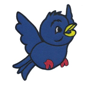 May include: A blue embroidered bird with red feet and a yellow beak. The bird is flying with its wings spread out.