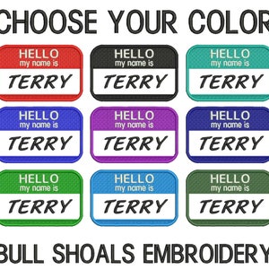 May include: Nine embroidered iron-on patches with the text "HELLO my name is TERRY" in different colors: red, black, teal, blue, purple, dark blue, green, light blue, and dark green. The text "BULL SHOALS EMBROIDERY" is at the bottom of the image.