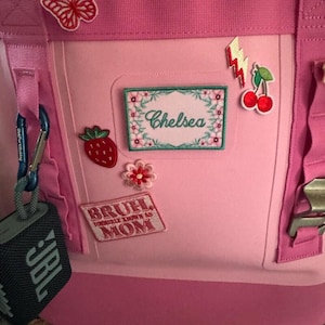 May include: A rustic wooden sign with the text "Welcome to our home" in a handwritten style. The sign is rectangular, with a distressed finish, and features a simple, inviting design. It's likely intended for indoor or outdoor home decor.