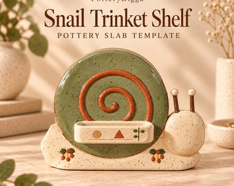 May include: A ceramic snail-shaped trinket shelf featuring a speckled cream body, a green spiral shell with a raised orange coil, and a small rectangular tray with a gold circle, orange triangle, and green leaf icon. Text reads PotteryDigga Snail Trinket Shelf POTTERY SLAB TEMPLATE.