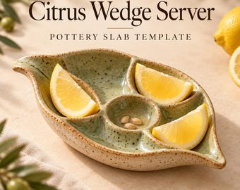 May include: A speckled light green ceramic dish shaped like a leaf with three compartments, containing three lemon wedges and three seeds. The text Citrus Wedge Server POTTERY SLAB TEMPLATE is printed above the dish.