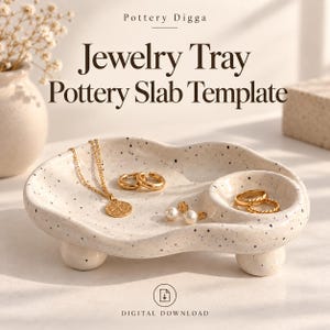 May include: A speckled off-white ceramic jewelry tray with an irregular organic shape, three small ball feet, and a circular recessed section. The text reads Pottery Digga Jewelry Tray Pottery Slab Template and Digital Download.